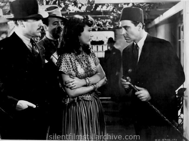 Gino Corrado, Sigrid Gurie and Joseph Calleia in ALGIERS (1938)