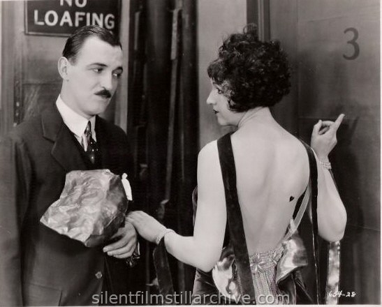 Raymond Griffith and Julia Faye in CHANGING HUSBANDS (1924)