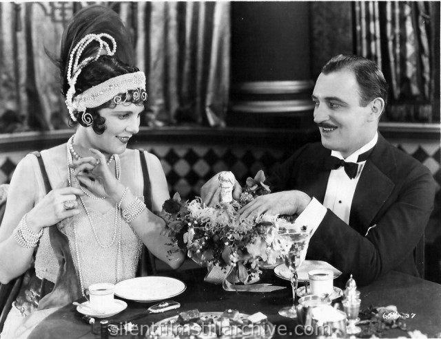 Leatrice Joy and Raymond Griffith in CHANGING HUSBANDS (1924)
