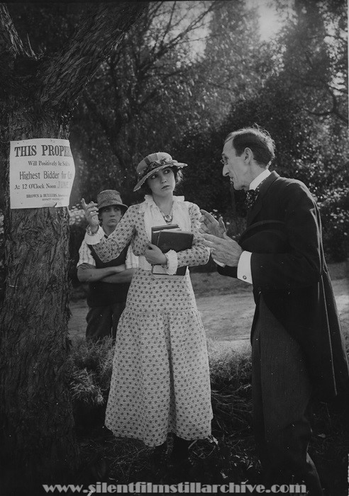 Gordon Griffith, Bessie Love, and Frank Hayes in CUPID FORCLOSES (1919).