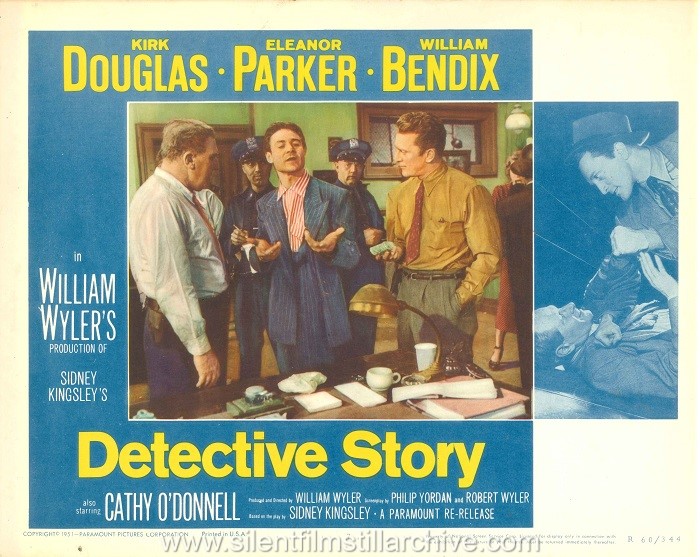 Lobby card with William Bendix, Joseph Wiseman, and Kirk Douglas in DETECTIVE STORY (1951).