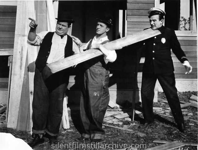 Oliver Hardy, Stan Laurel, and Edgar Kennedy in THE FINISHING TOUCH (1928)