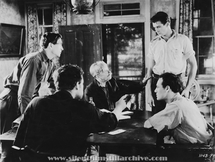 Paul Fix, Malcolm Williams, Gary Cooper, and Lane Chandler in THE FIRST KISS (1928).