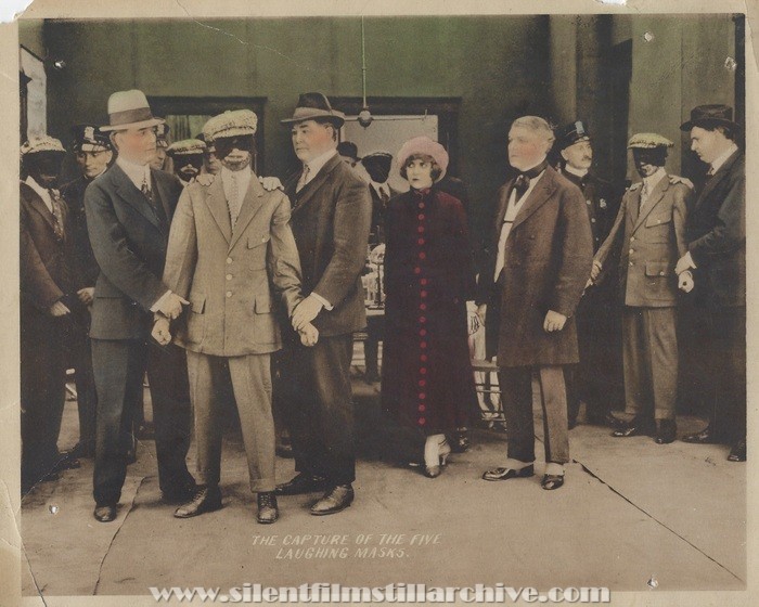Pearl White and Edward Jos in THE IRON CLAW (1916)