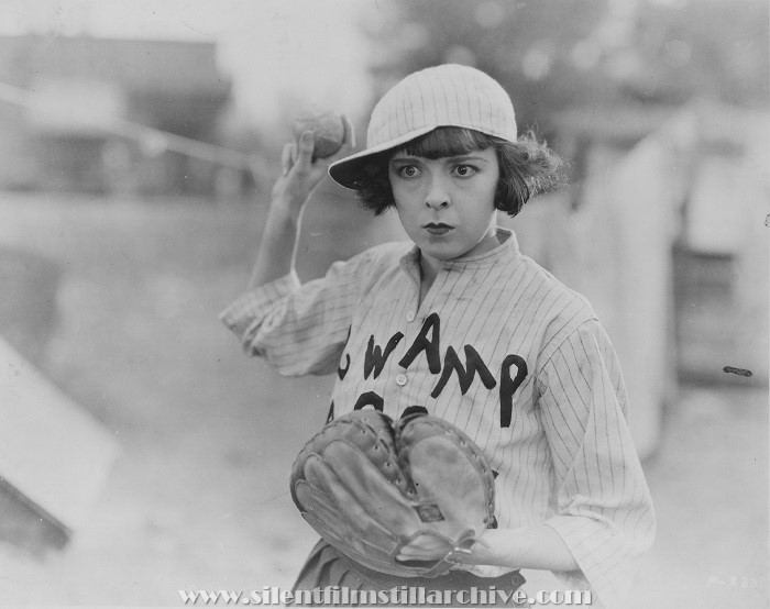 Colleen Moore throws a baseball in PAINTED PEOPLE (1924)