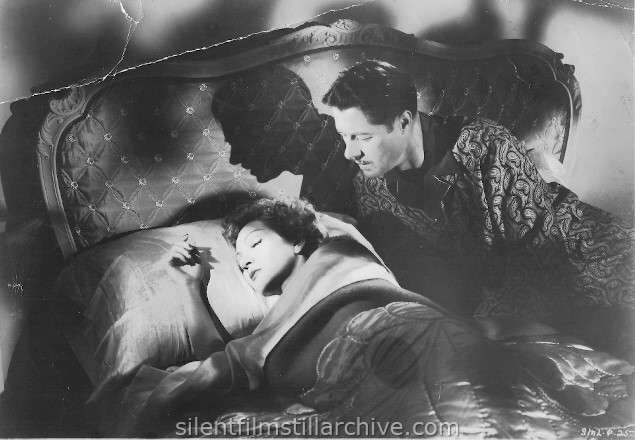 Claudette Cobert and Don Ameche in SLEEP, MY LOVE (1948)