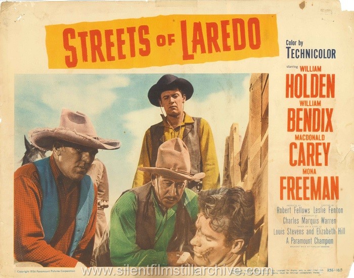 Lobby card with William Bendix, Alfonso Bedoya and William Holden in STREETS OF LAREDO (1949)