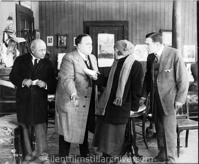 Russell Bassett, Frank McIntyre and Doris Kenyon in THE TRAVELLING SALESMAN (1916)