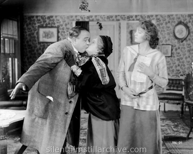 Frank McIntyre, Julia Stewart and Doris Kenyan in THE TRAVELING SALESMAN (1916)