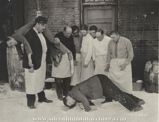 Tiny Sanford, Stan Laurel and Oliver Hardy in BELOW ZERO (1930)