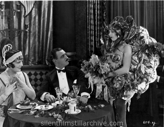 Leatrice Joy and Raymond Griffith in CHANGING HUSBANDS (1924)