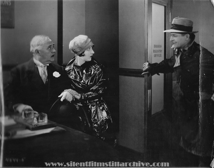 Otis Harlan, Gertrude Olmstead, and Reginald Denny in THE CHEERFUL FRAUD (1926)