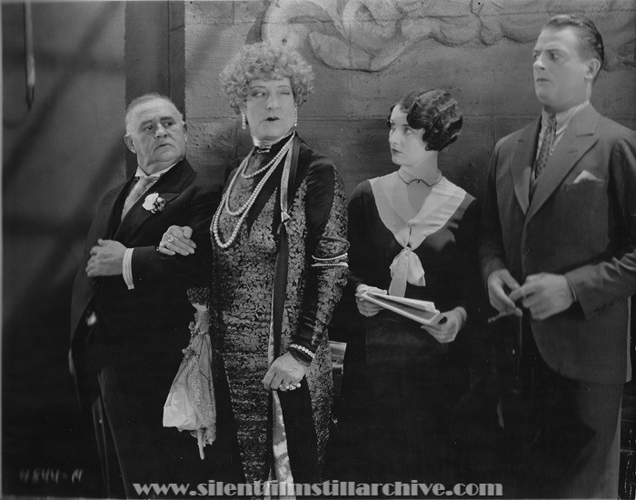 Otis Harlan, Emily Fitzroy, Gertrude Olmstead, and Reginald Denny in THE CHEERFUL FRAUD (1926)