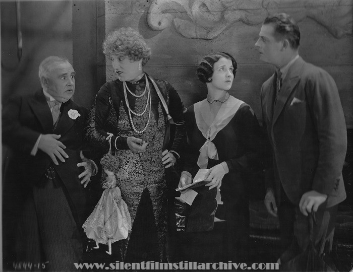 Otis Harlan, Emily Fitzroy, Gertrude Olmstead, and Reginald Denny in THE CHEERFUL FRAUD (1926)