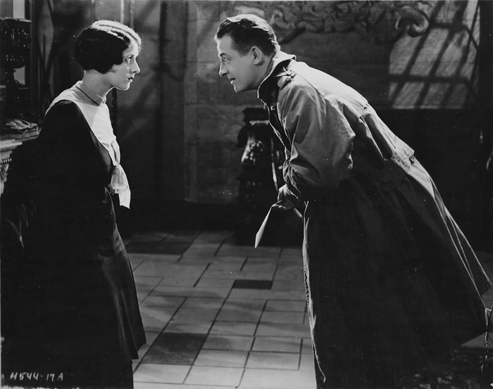 Gertrude Olmstead and Reginald Denny in THE CHEERFUL FRAUD (1926)