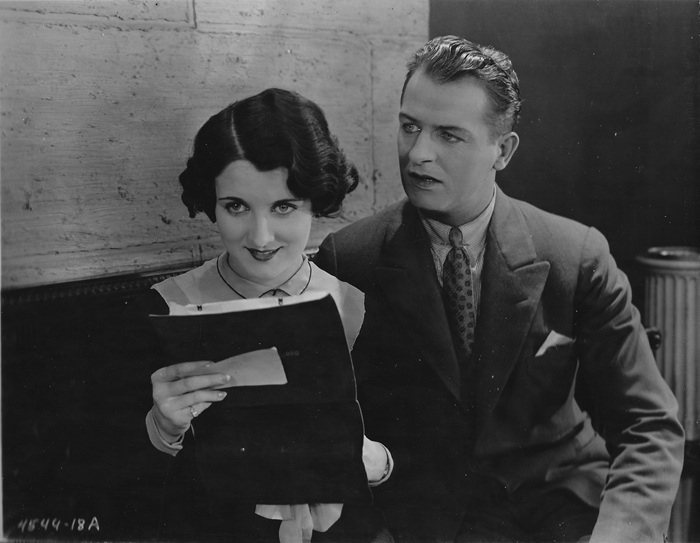 Gertrude Olmstead and Reginald Denny in THE CHEERFUL FRAUD (1926)
