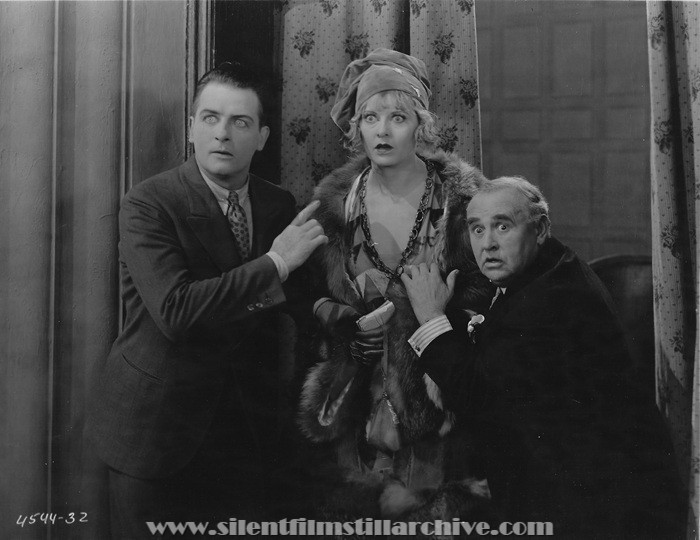 Reginald Denny, Gertrude Astor, and Otis Harlan in THE CHEERFUL FRAUD (1926)