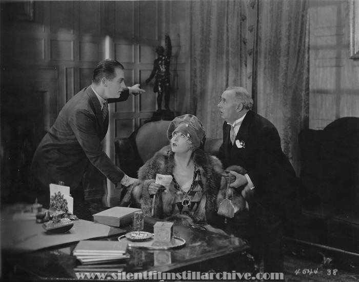 Reginald Denny, Gertrude Astor, and Otis Harlan in THE CHEERFUL FRAUD (1926)