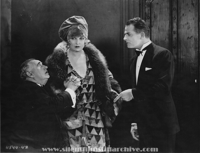 Otis Harlan, Gertrude Astor, and Reginald Denny in THE CHEERFUL FRAUD (1926)
