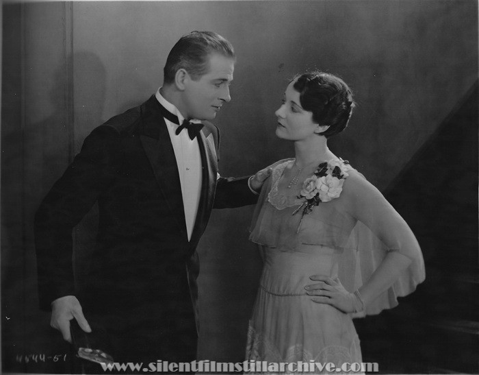Reginald Denny and Gertrude Olmstead in THE CHEERFUL FRAUD (1926)