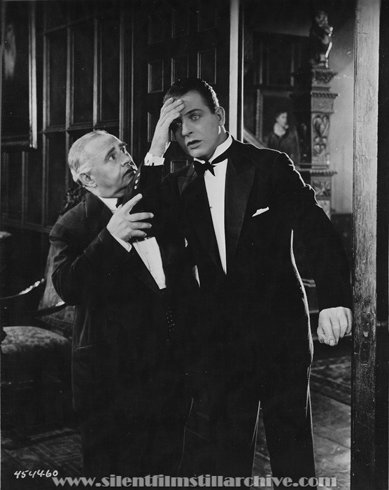 Otis Harlan and Reginald Denny in THE CHEERFUL FRAUD (1926)