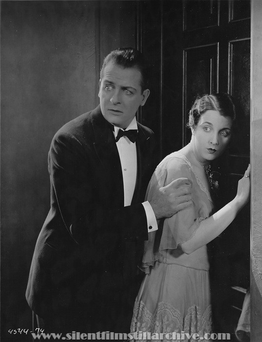 Reginald Denny and Gertrude Olmstead in THE CHEERFUL FRAUD (1926)