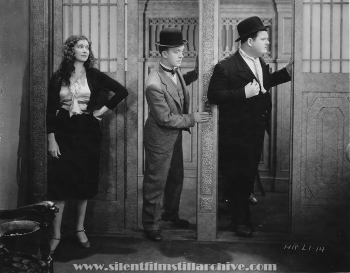 Mae Busch, Stan Laurel, and Oliver Hardy in COME CLEAN (1931)