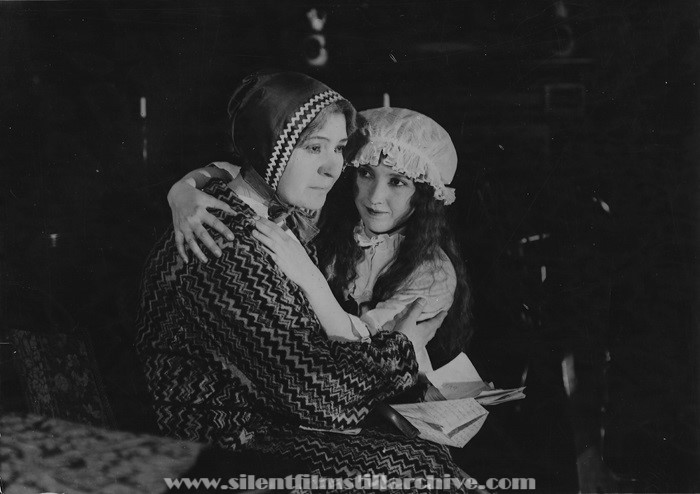 Dorthea Wolbert and Bessie Love in CUPID FORCLOSES (1919).