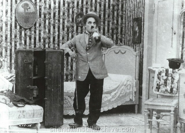 Charlie Chaplin in THE CURE (1917).