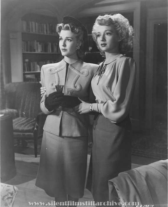 Anita Louise and Evelyn Keyes in DANGEROUS BLONDES (1943).