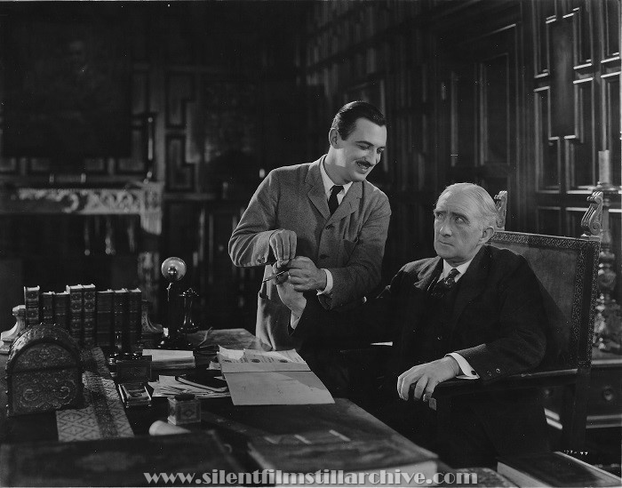 Raymond Griffith and Alec B. Francis in THE ETERNAL THREE (1923)