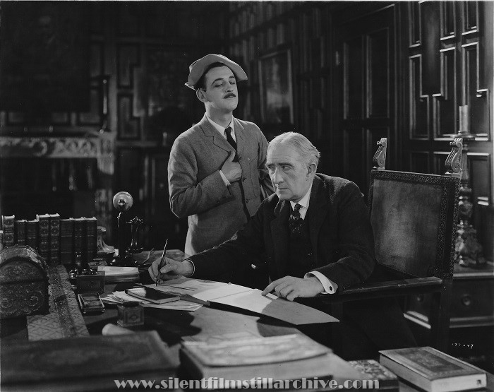 Raymond Griffith and Alec B. Francis in THE ETERNAL THREE (1923)
