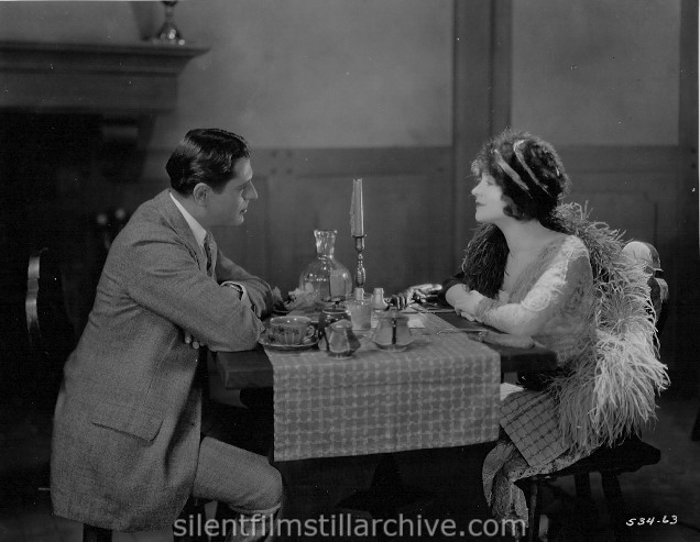 Betty Compson and Warner Baxter in THE FEMALE (1924)