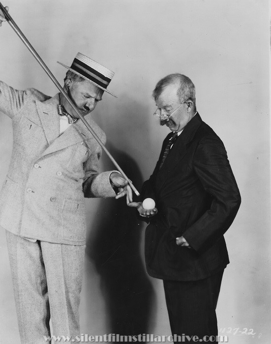 W. C. Fields (with pool cue) and Chester Conklin in FOOLS FOR LUCK (1928)