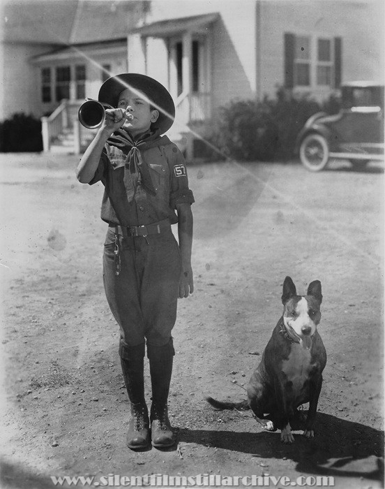 Joe Butterworth and Brownie the dog in THE GOOD BAD BOY (1924)