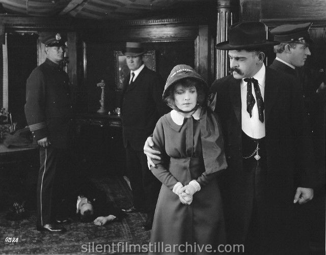 Charles West, Fanny Ward and Ronald Bradbury in A GUTTER MAGDALENE (1916).