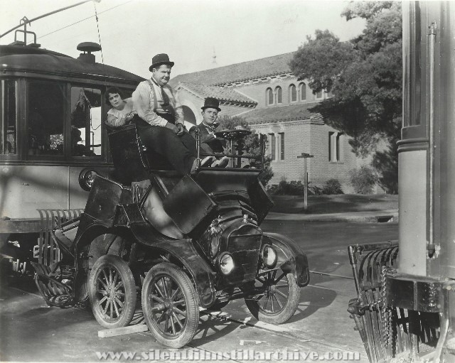 Fay Holderness, Oliver Hardy and Stan Laurel in HOG WILD (1930)