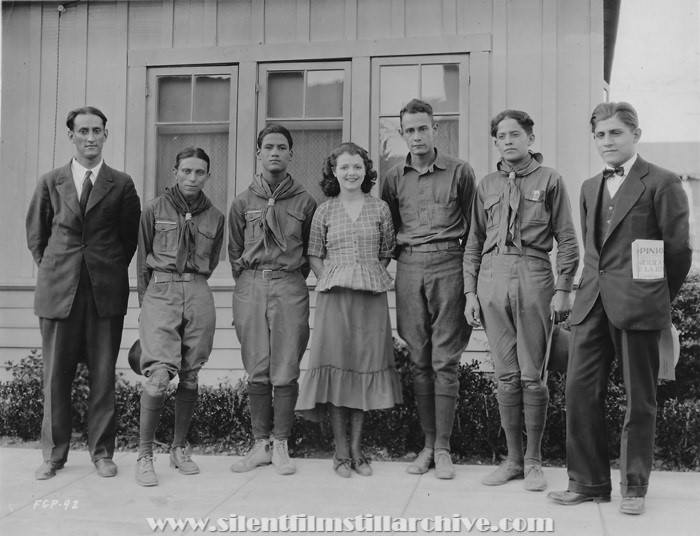 Janet Gaynor welcomes some Boy Scouts to the Fox studio during the filming of STREET ANGEL (1927).