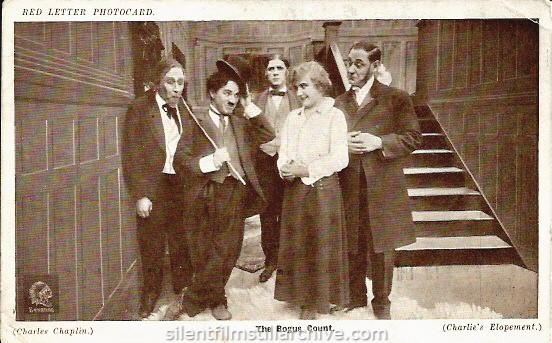 Paddy McGuire, Charlie Chaplin, Lloyd Bacon, Edna Purviance and Fred Goodwins in A JITNEY ELOPEMENT (1915). Red Letter Photocard