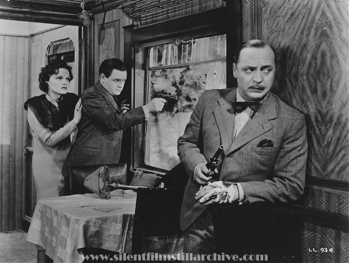 Linden Travers, Naunton Wayne, and Basil Radford in THE LADY VANISHES (1938)