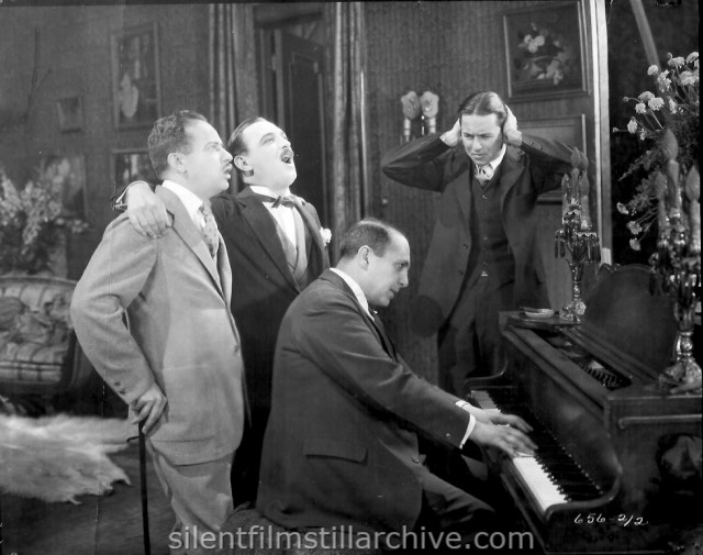Production Photo of LILY OF THE DUST (1924) with Paul Bern, Raymond Griffith, directory Dimitri Buchowetzki and Ben Lyon.