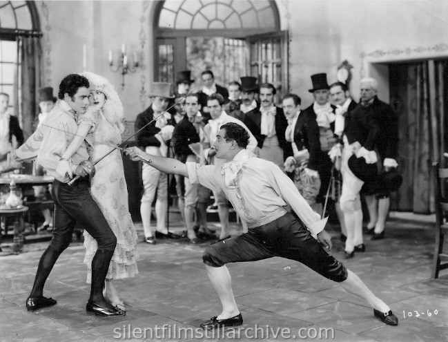 Gilbert Roland, Billie Dove and Armand Kaliz in THE LOVE MART (1927)