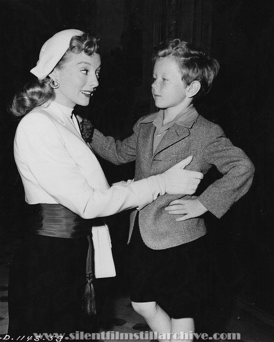 Evelyn Keyes and Jimmy Hunt in THE MATING OF MILLIE (1948)