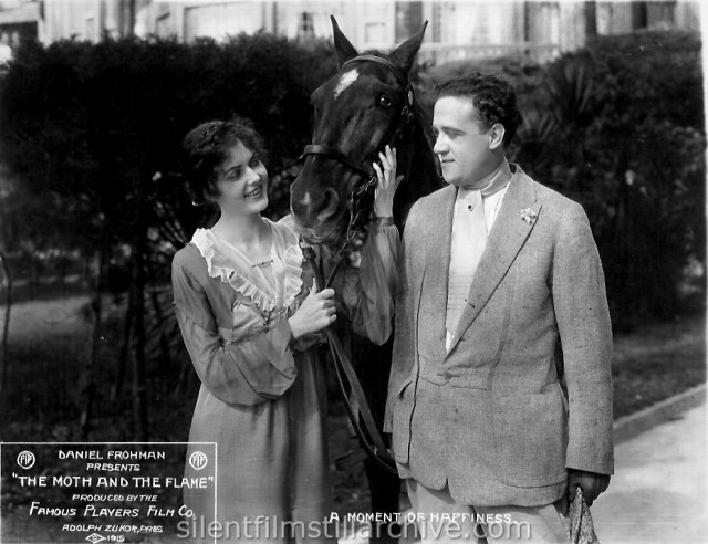 Adele Ray (Rey) and Bradley Barker in THE MOTH AND THE FLAME (1915)