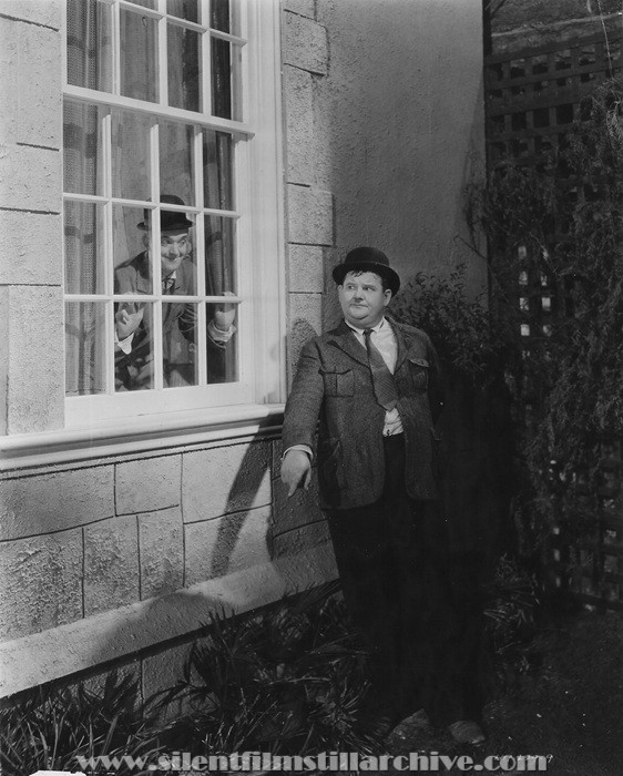 Stan Laurel and Oliver Hardy in NIGHT OWLS (1930).