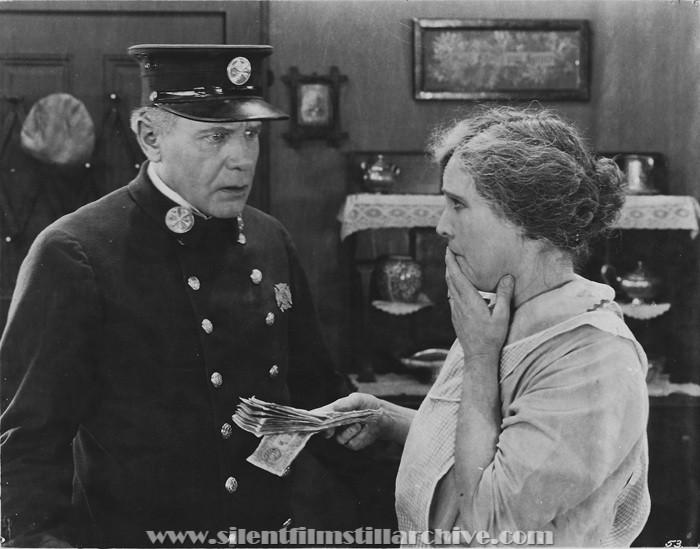 Ralph Lewis and Claire McDowell in ONE OF THE BRAVE (1925)