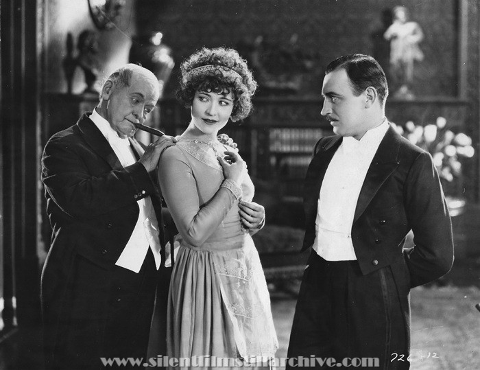Bert Woodruff, Betty Compson, and Raymond Griffith in PATHS TO PARADISE (1926)