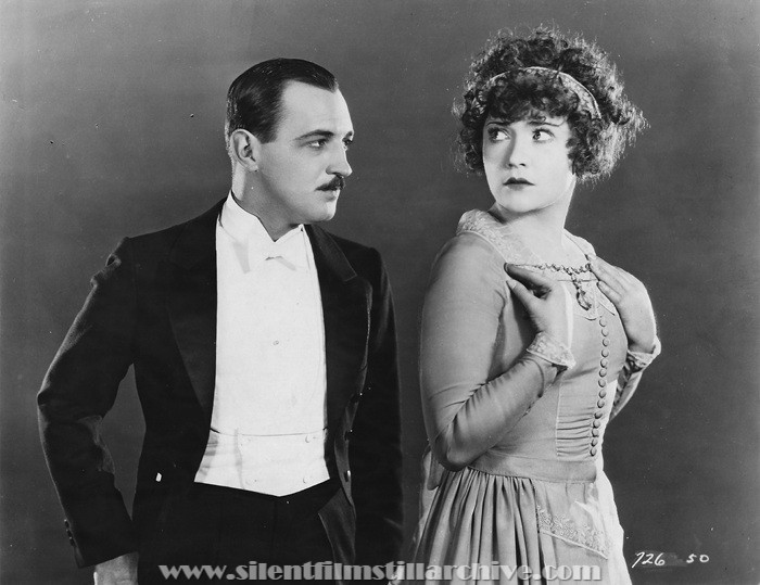 Raymond Griffith and Betty Compson in PATHS TO PARADISE (1926)
