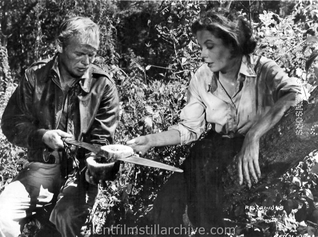 Richard Widmark and Jane Greer in RUN FOR THE SUN (1956)