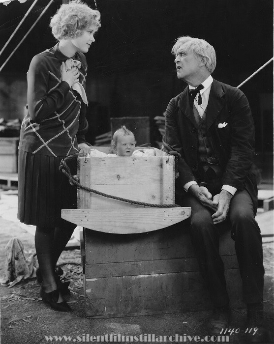 Esther Ralston and Hobart Bosworth with baby in THE SAWDUST PARADISE (1928).